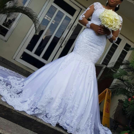 Vintage Lace Mermaid Wedding Dresses 2019 With Long Sleeve African Applique Illusion Buttons Back Sweep Train Bridal Gown robe de mariee
